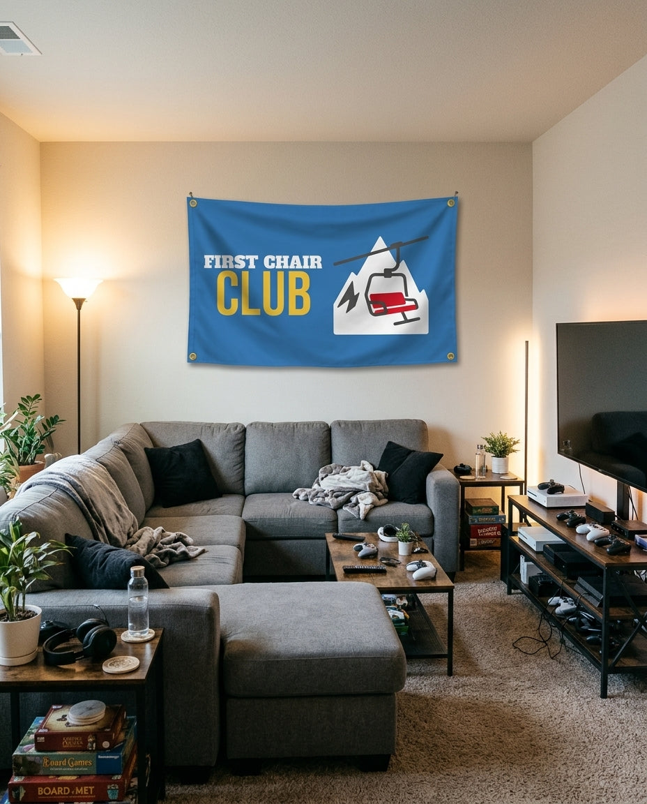 First Chair Club flag decorating a game room wall