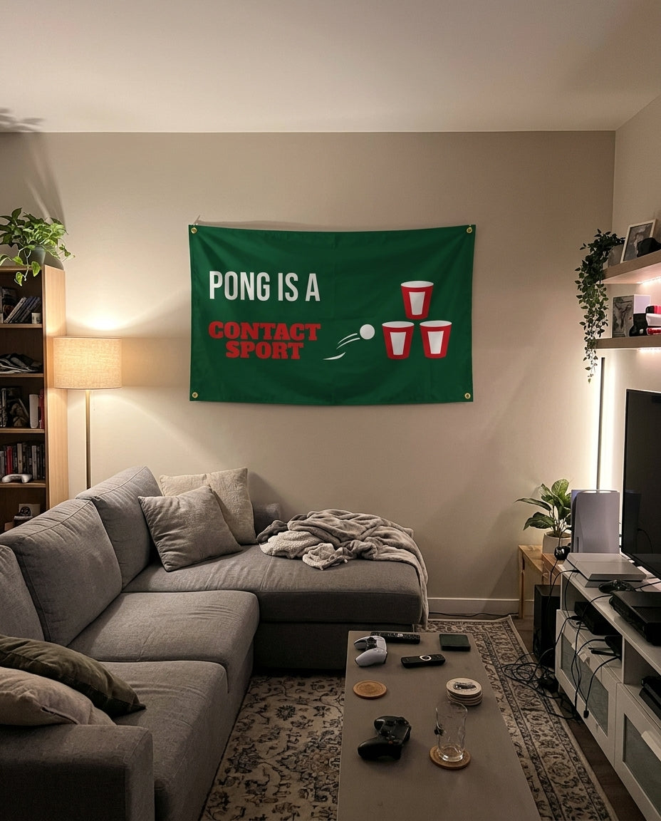 Pong Is A Contact Sport flag decorating a game room wall