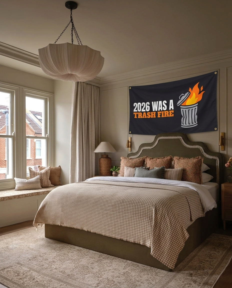 2026 Was A Trash Fire New Year's Eve wall flag hanging in a bedroom