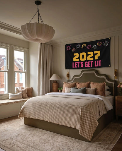 2027 Lets Get Lit New Year's wall flag hanging in a bedroom