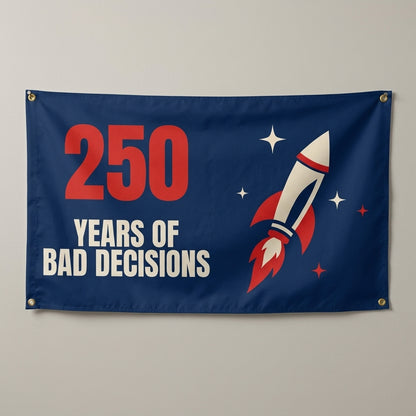 250 Years Of Bad Decisions flag 3x5 in navy and red with a retro firework rocket, hung on a wall