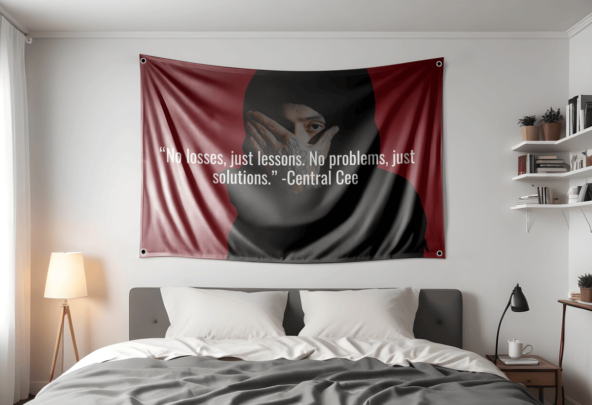 Central Cee Rapper Flag with the quote "No losses, just lessons. No Problems, just solutions" by Central Cee on a 3x5ft flag. On a dorm room wall 