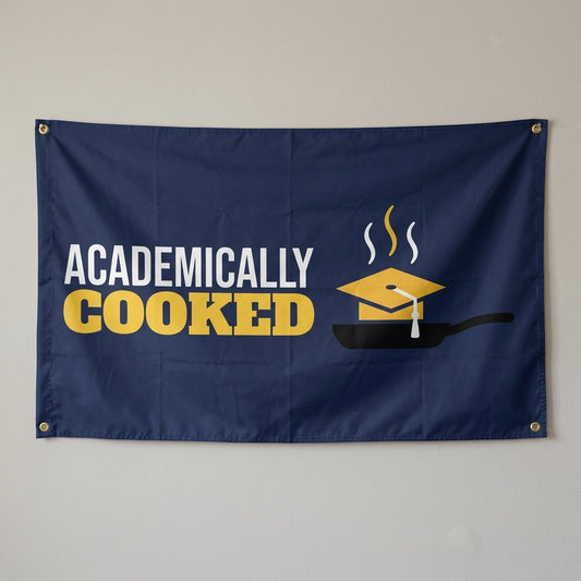 Academically Cooked flag 3x5 in navy with a grad cap in a frying pan, hung on a wall