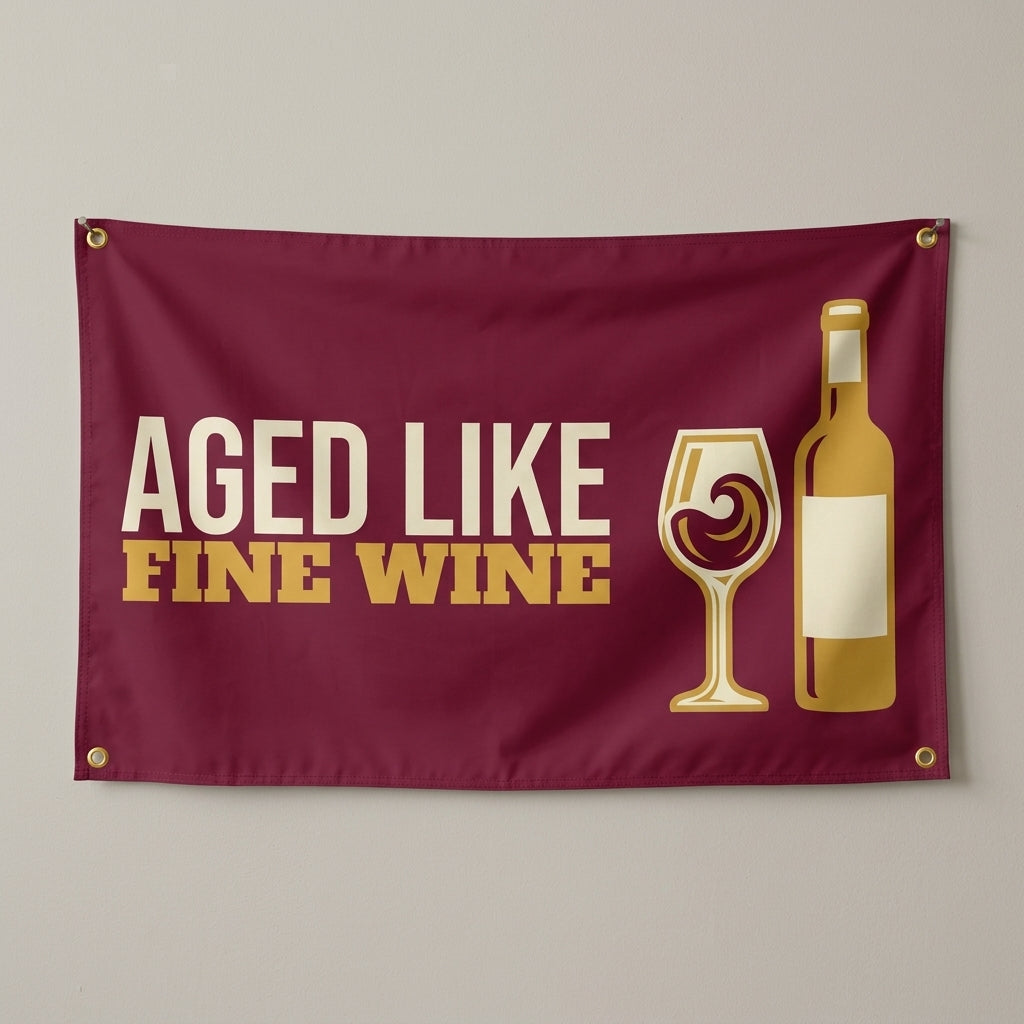 Aged Like Fine Wine flag 3x5 in burgundy with a wine glass and bottle, hung on a wall