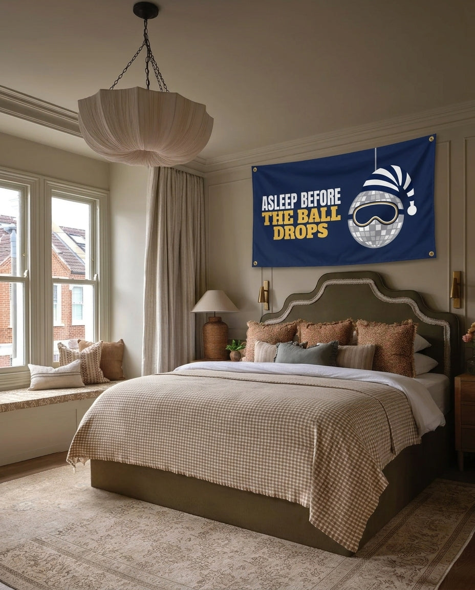 Asleep Before The Ball Drops New Year's Eve wall flag hanging in a bedroom