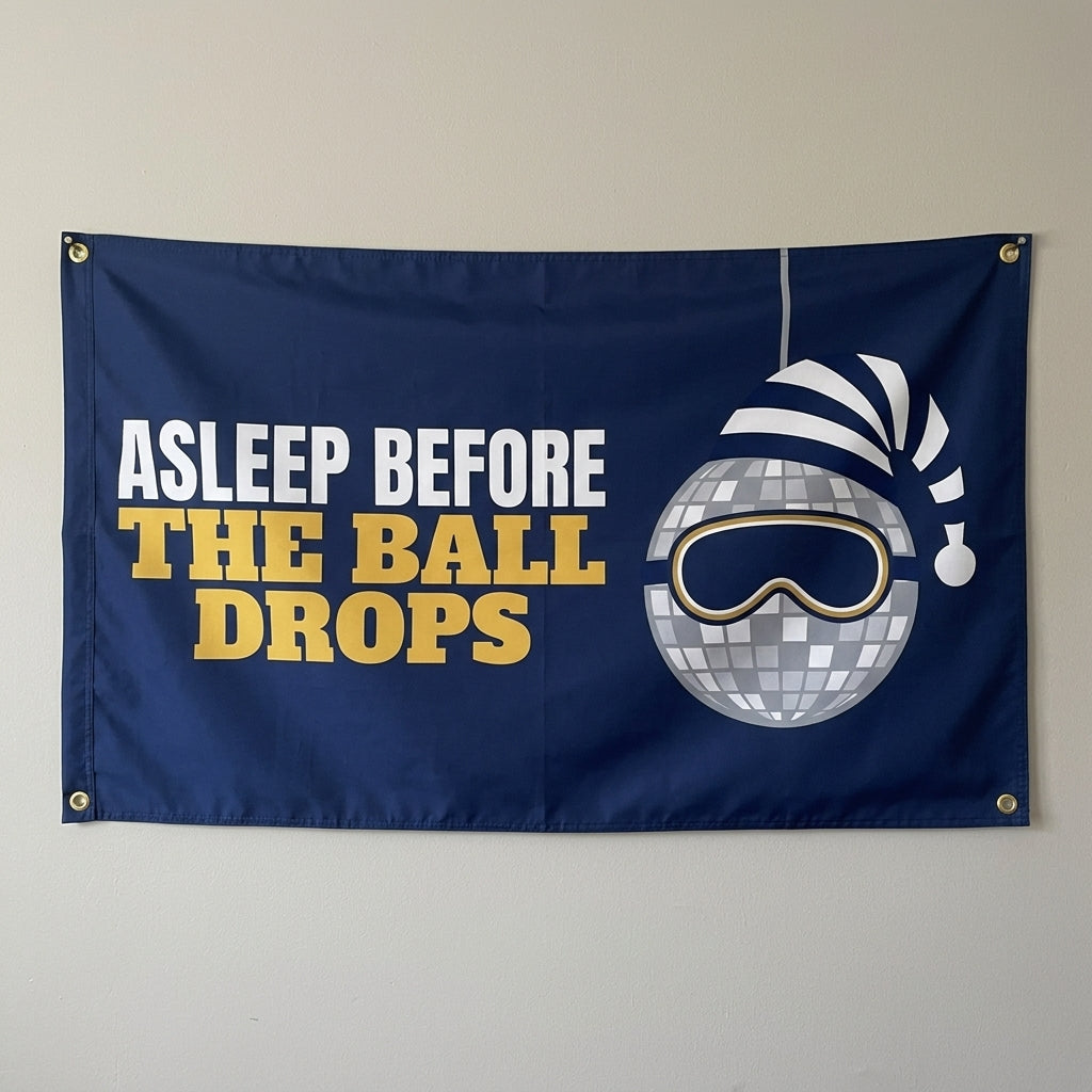 Asleep Before The Ball Drops flag 3x5 in navy with a sleepy disco ball in a nightcap, hung on a wall