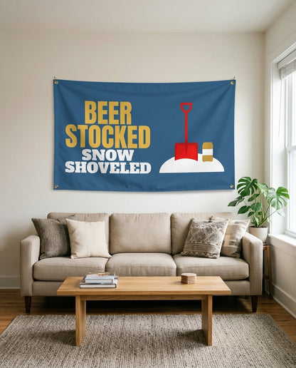 Beer Stocked Snow Shoveled flag used as living room wall decor