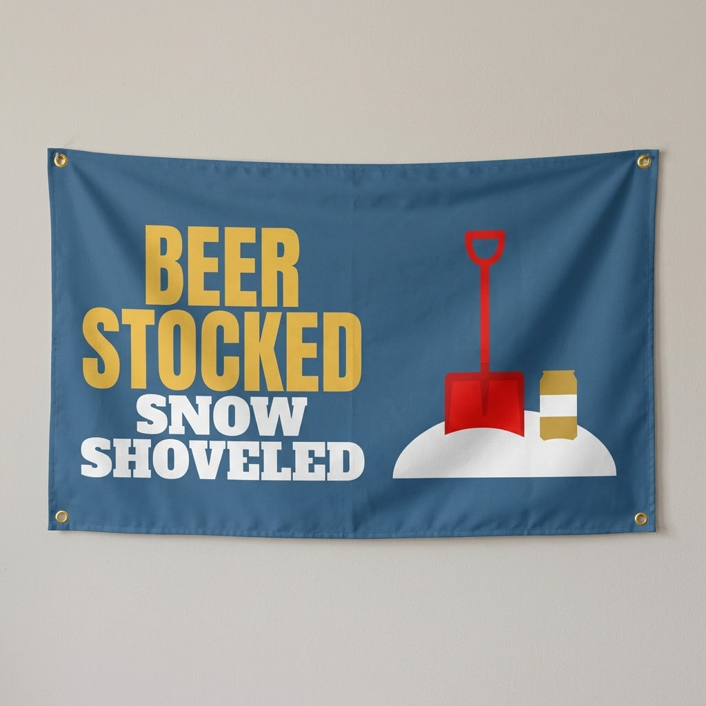 Beer Stocked Snow Shoveled flag 3x5 in steel blue with a snow shovel and beer can, hung on a wall