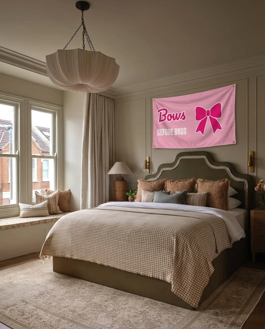 Bows Before Bros funny wall flag hanging in a bedroom