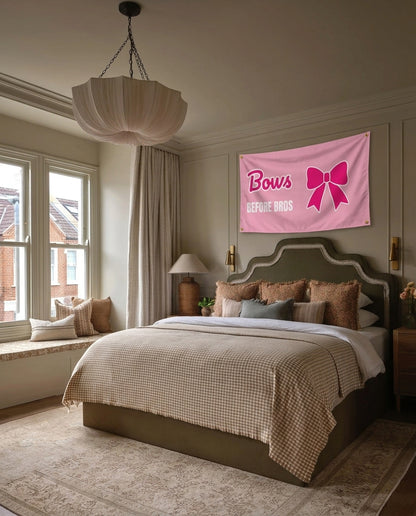 Bows Before Bros funny wall flag hanging in a bedroom