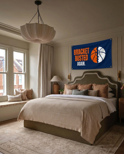 Bracket Busted Again basketball wall flag hanging in a bedroom