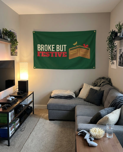 Broke But Festive flag decorating a game room wall