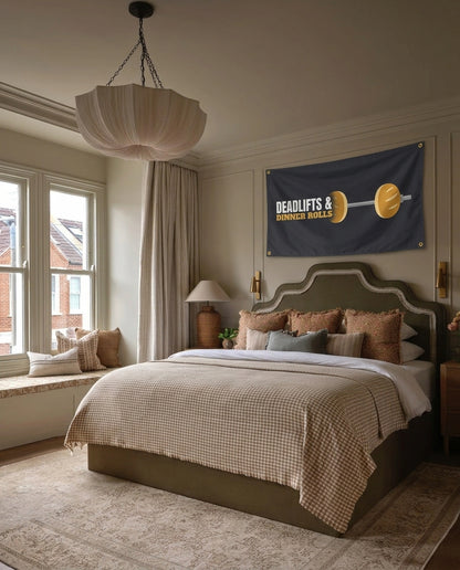 Deadlifts And Dinner Rolls gymnastics wall flag hanging in a bedroom