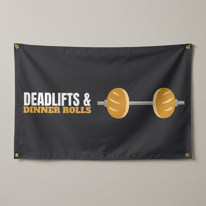 Deadlifts And Dinner Rolls flag 3x5 in charcoal with a barbell with dinner rolls, hung on a wall