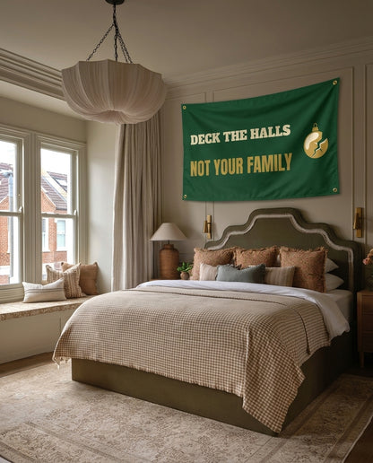 Deck The Halls Not Your Family Christmas wall flag hanging in a bedroom