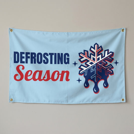 Melting Snowflake Season flag 3x5 in light blue with a melting snowflake, hung on a wall