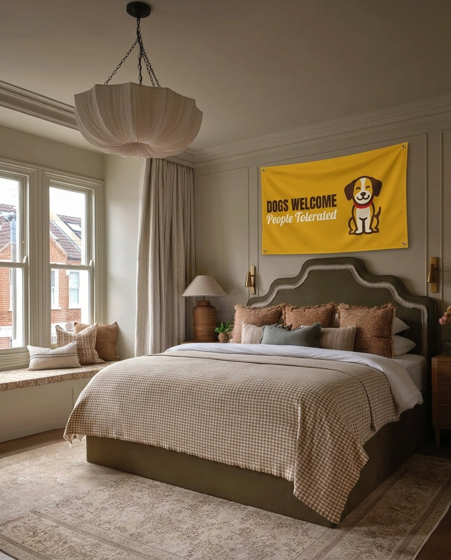 Dogs Welcome People Tolerated dog lover wall flag hanging in a bedroom
