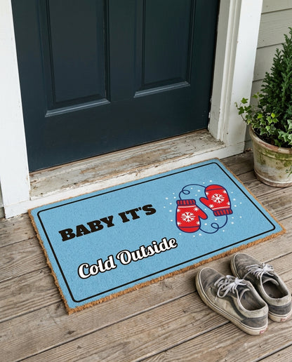 Baby Its Cold Outside winter doormat on a front porch