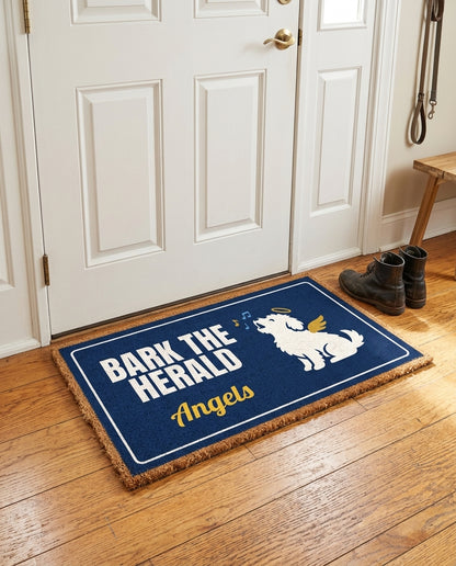 Bark The Herald Angels welcome mat in a home entryway