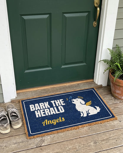 Bark The Herald Angels dog Christmas doormat on a front porch