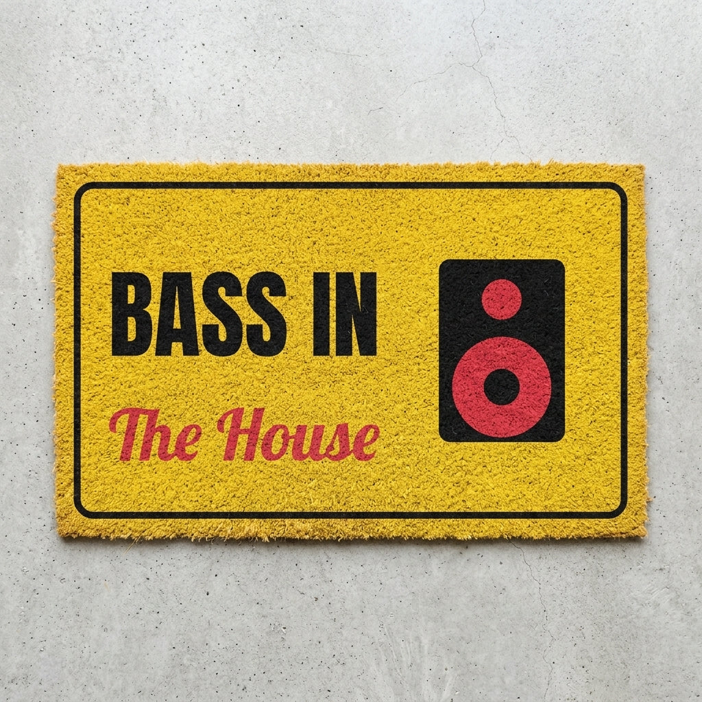 Bass In The House doormat 30x18 in bright yellow with a speaker