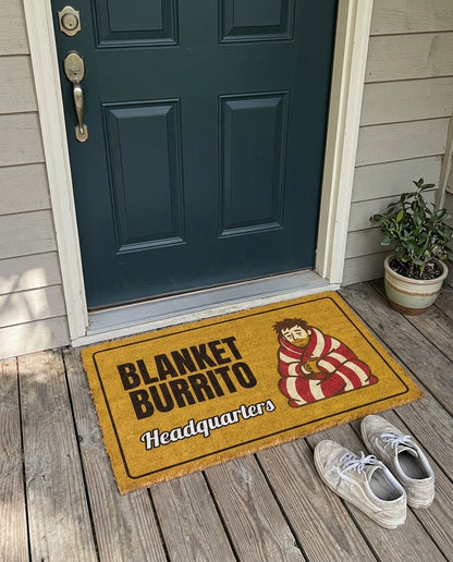 Blanket Burrito Headquarters funny winter doormat on a front porch