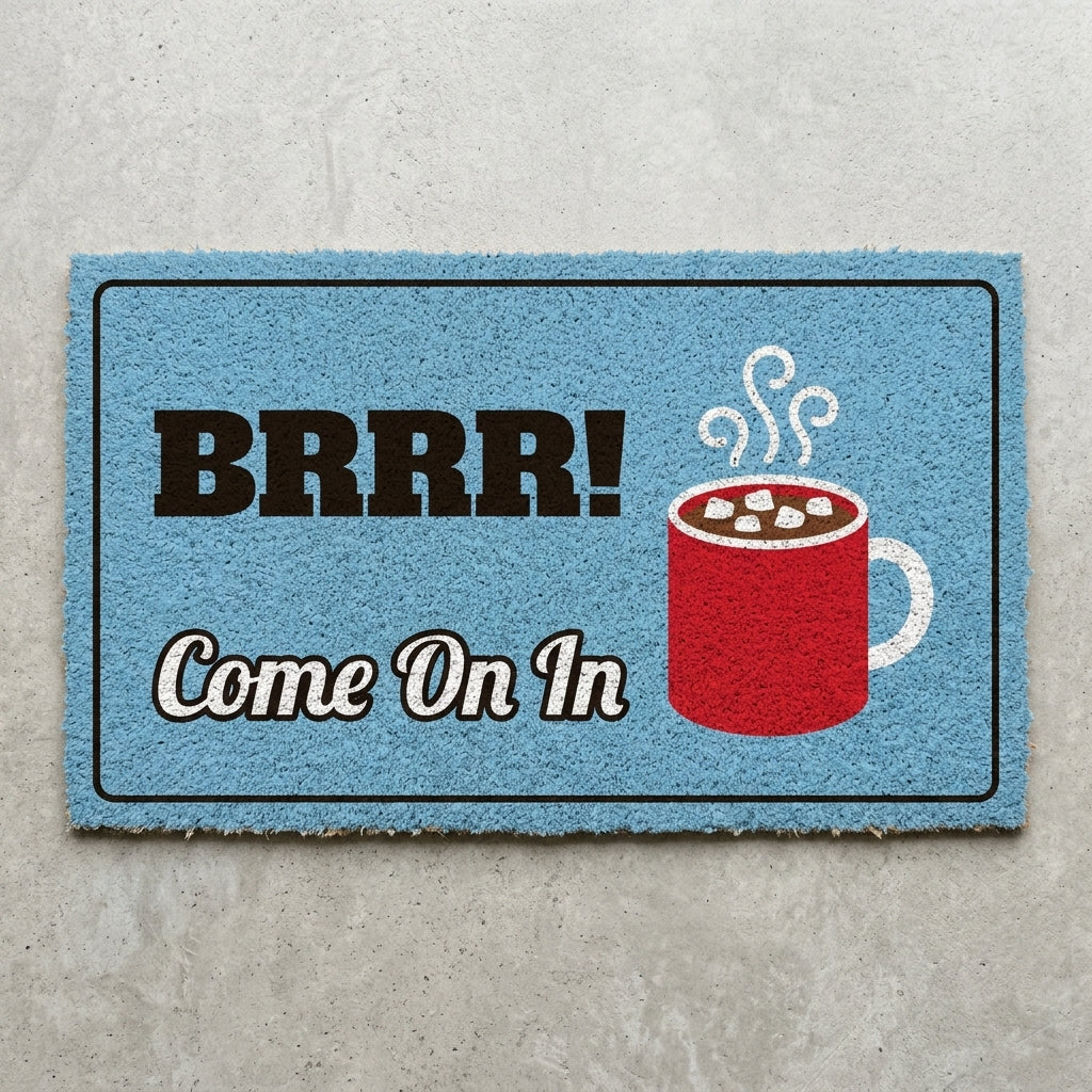 Brrr Come On In doormat 30x18 in light blue with a mug of cocoa