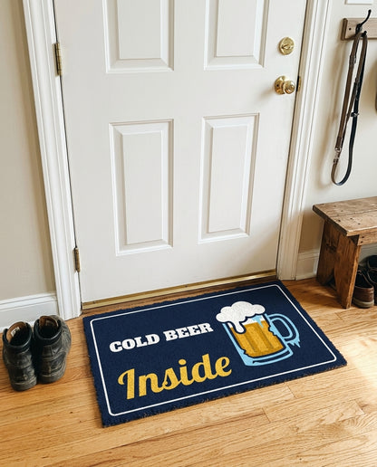 Cold Beer Inside welcome mat in a home entryway