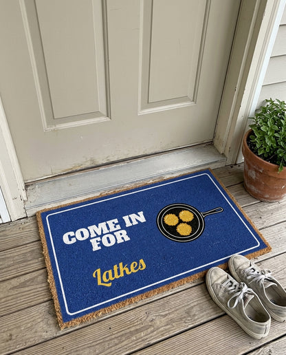 Come In For Latkes Hanukkah doormat on a front porch