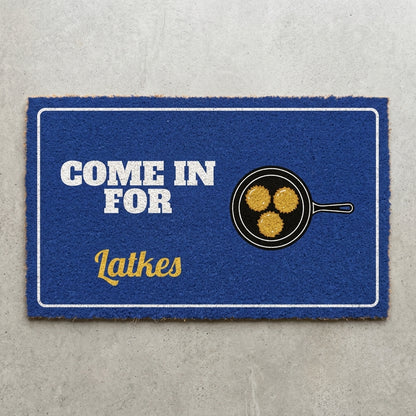 Come In For Latkes doormat 30x18 in royal blue with a skillet of latkes