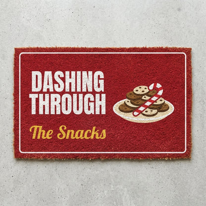 Dashing Through The Snacks doormat 30x18 in red with a plate of cookies and a candy cane