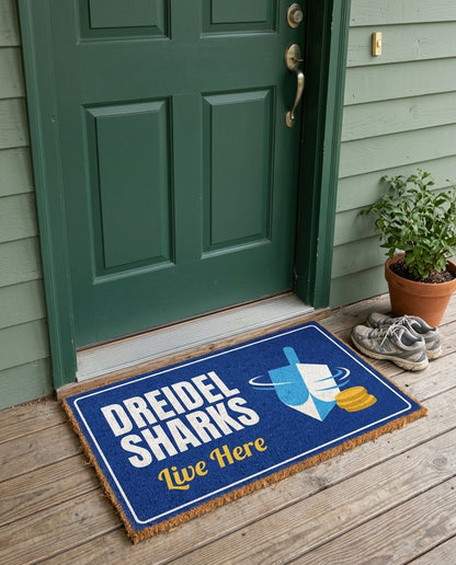 Dreidel Sharks Live Here Hanukkah doormat on a front porch