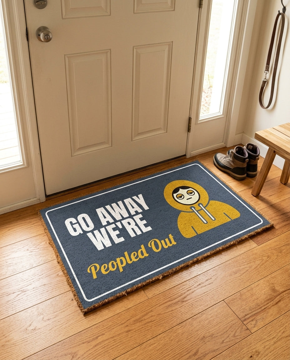 Go Away Were Peopled Out welcome mat in a home entryway