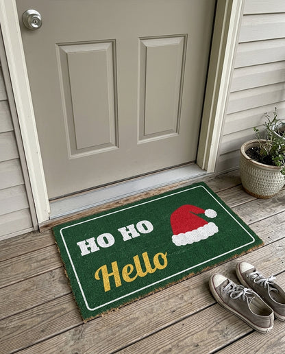 Ho Ho Hello Christmas doormat on a front porch