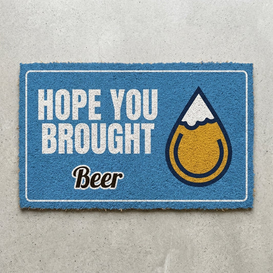 Hope You Brought Beer doormat 30x18 in blue with a golden beer drop