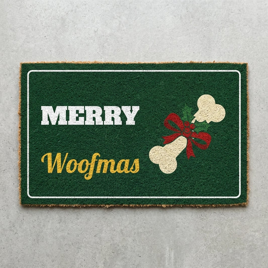 Merry Woofmas doormat 30x18 in green with a bone and a bow