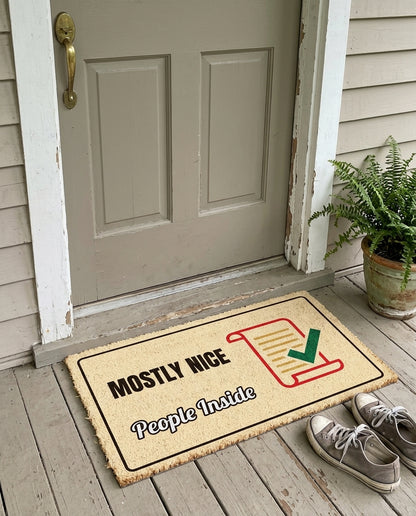 Mostly Nice People Inside funny Christmas doormat on a front porch