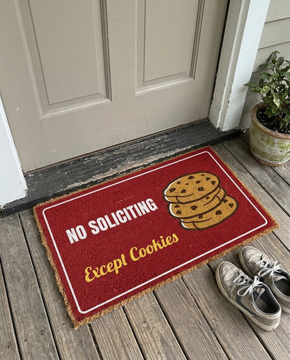 No Soliciting Except Cookies funny holiday doormat on a front porch