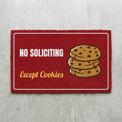 No Soliciting Except Cookies doormat 30x18 in red with a stack of cookies
