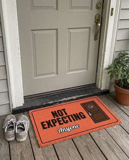 Not Expecting Anyone funny doormat on a front porch