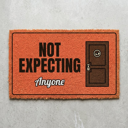 Not Expecting Anyone doormat 30x18 in coral with a door and a peeking eye