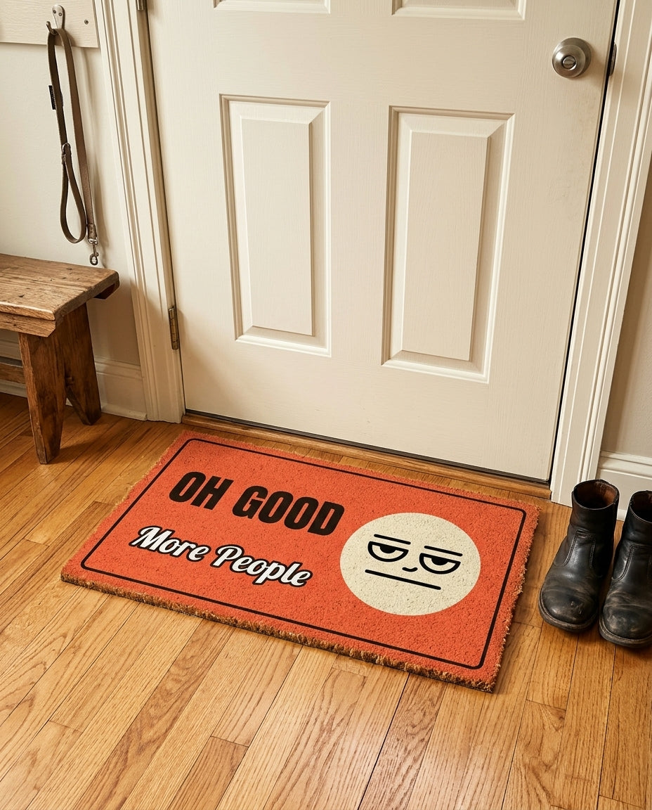 Oh Good More People welcome mat in a home entryway