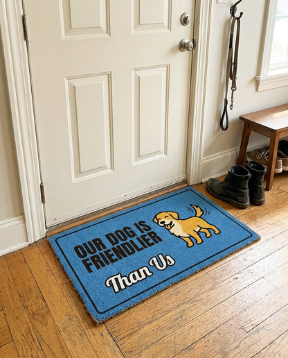 Our Dog Is Friendlier Than Us welcome mat in a home entryway