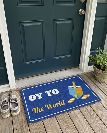 Oy To The World Hanukkah doormat on a front porch