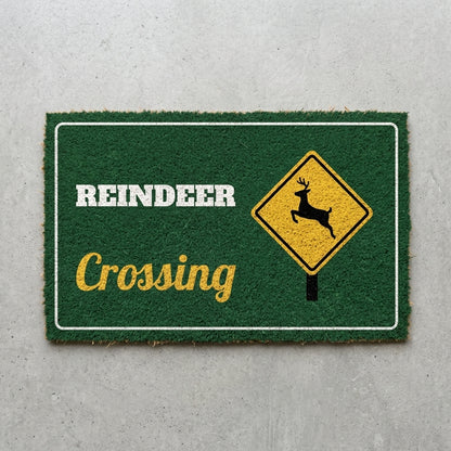 Reindeer Crossing doormat 30x18 in green with a reindeer road sign