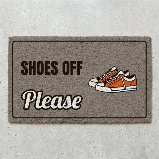 Shoes Off Please doormat 30x18 in gray with a pair of sneakers