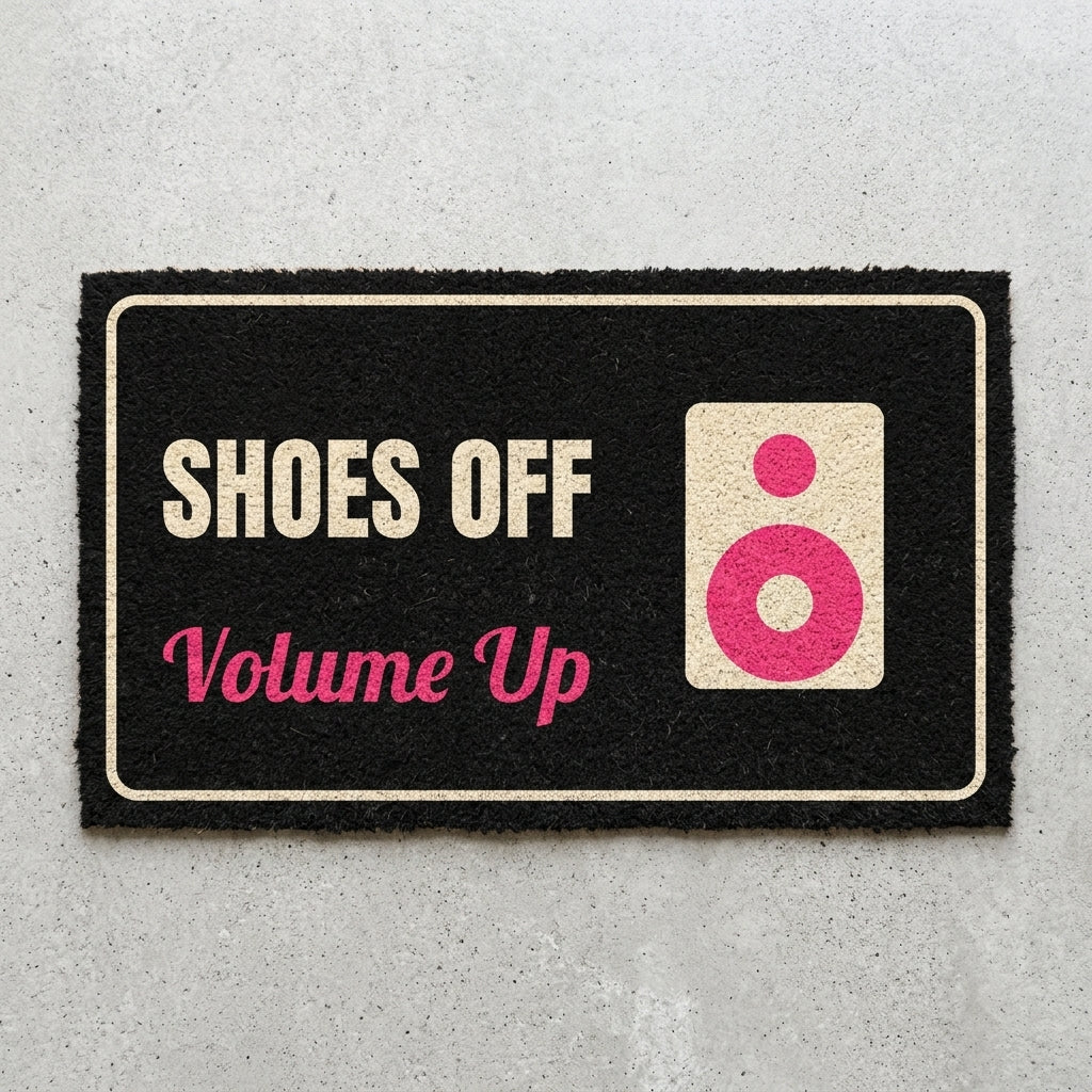 Shoes Off Volume Up doormat 30x18 in black with a speaker