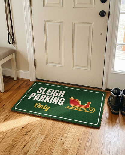 Sleigh Parking Only welcome mat in a home entryway