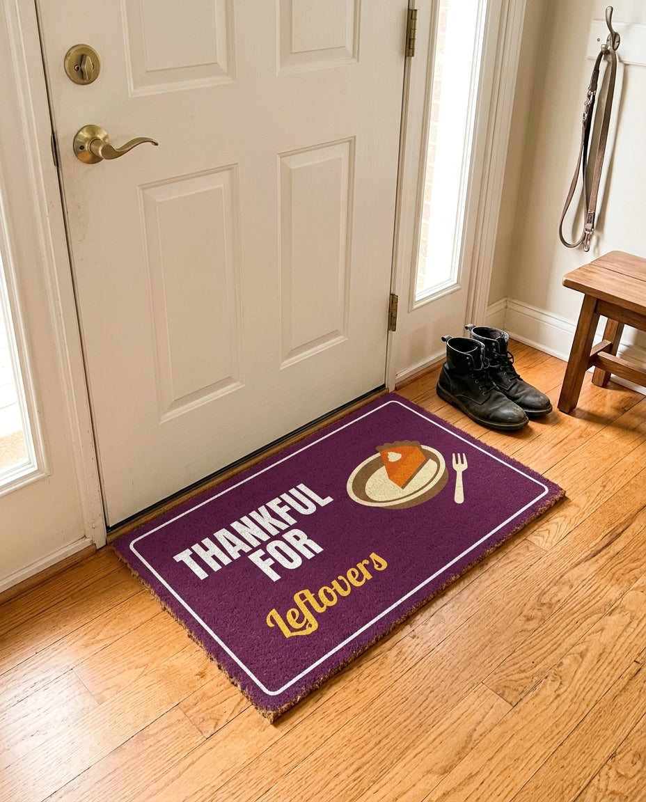 Thankful For Leftovers welcome mat in a home entryway