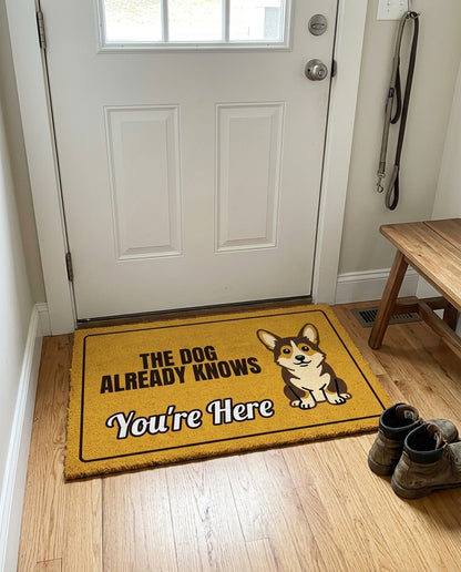 The Dog Already Knows Youre Here welcome mat in a home entryway